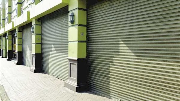 "٢١٨"مخالفة للمحلات الغيرملتزمة بقرار رئيس الوزراء