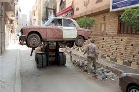 رفع سيارات ودراجات متهالكة من الشوارع