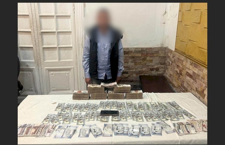 وقوع تاجر العملات الاجنبية في قبضة الشرطة بالجيزة