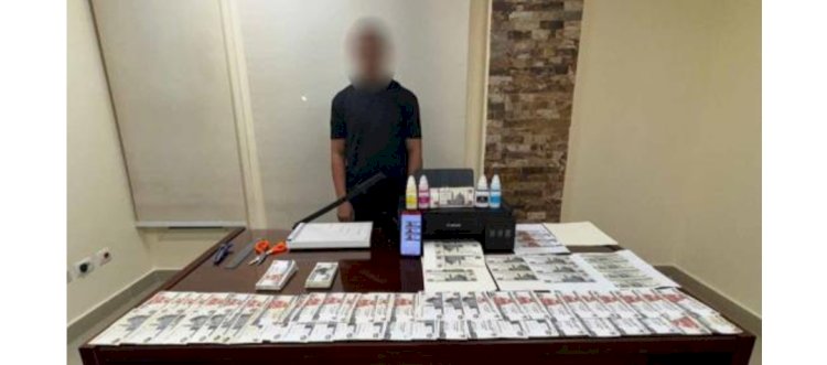 ضبط فني تحاليل لقيامه بتقليد العملاات بالجيزة