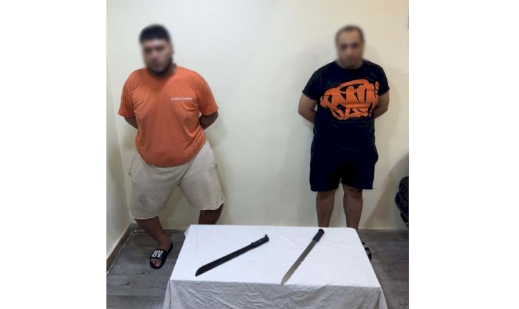ضبط شقيقين لقيامهما بممارسة أعمال البلطجة بإستخدام أسلحة بالجيزة